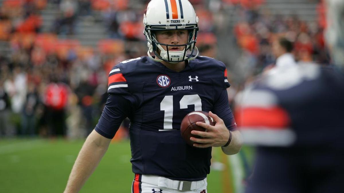 Auburn quarterback Sean White warms up before the team plays Idaho at Jordan-Hare Stadium.