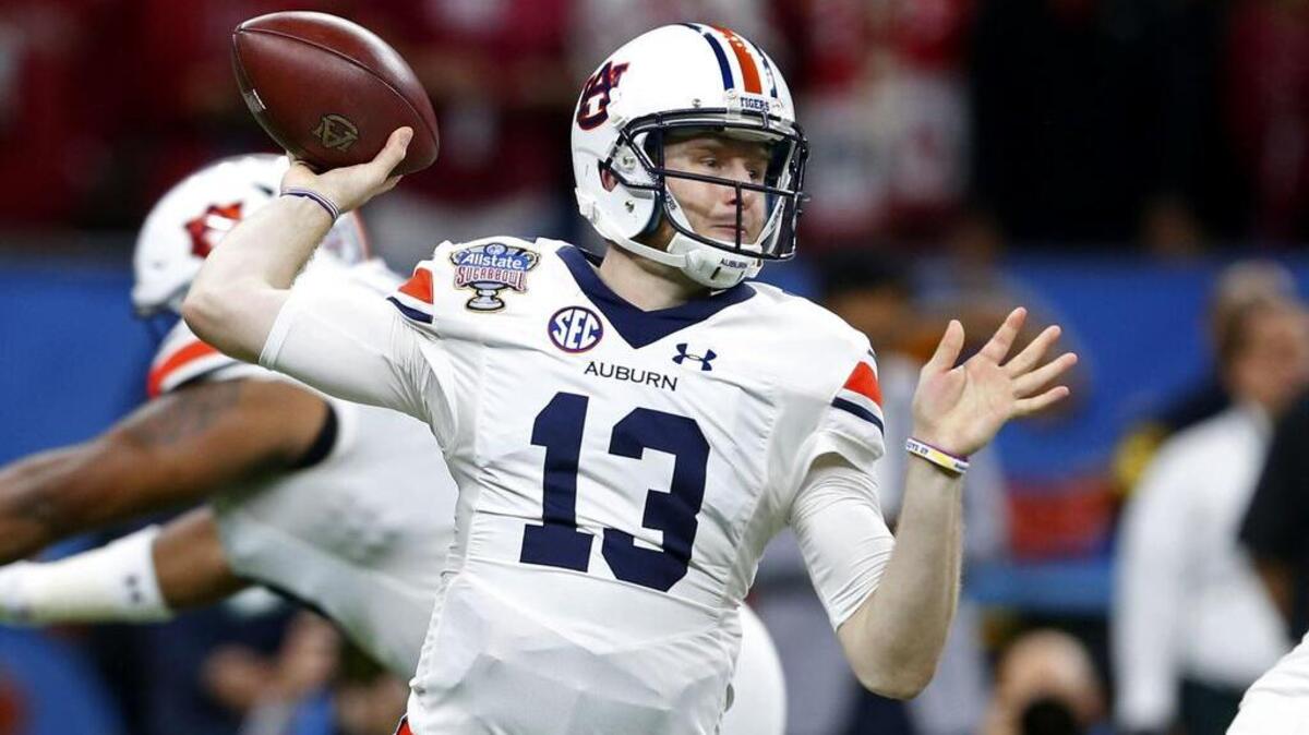 Auburn quarterback Sean White, No. 13, passes in the first half of the Sugar Bowl NCAA college football game against Oklahoma in New Orleans, Monday, Jan. 2, 2017.