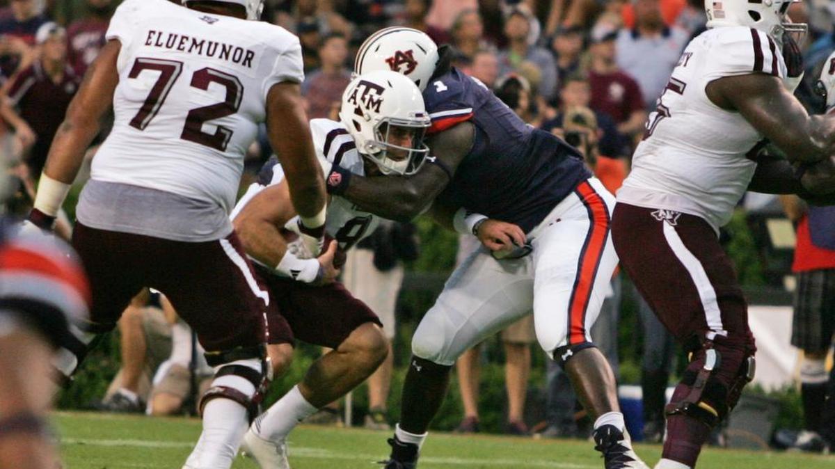 Auburn defensive lineman Montravius Adams sacks Texas A&M quarterback Trevor Knight Saturday, Sept. 18, 2016 at Jordan-Hare Stadium.