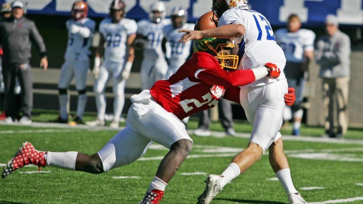 Auburn verbal commit Tadarian Moultry sacks quarterback Myles Brennan in the Alabama-Mississippi 30th Annual All-Star Game at Cramton Bowl Saturday, Dec. 10, 2016.