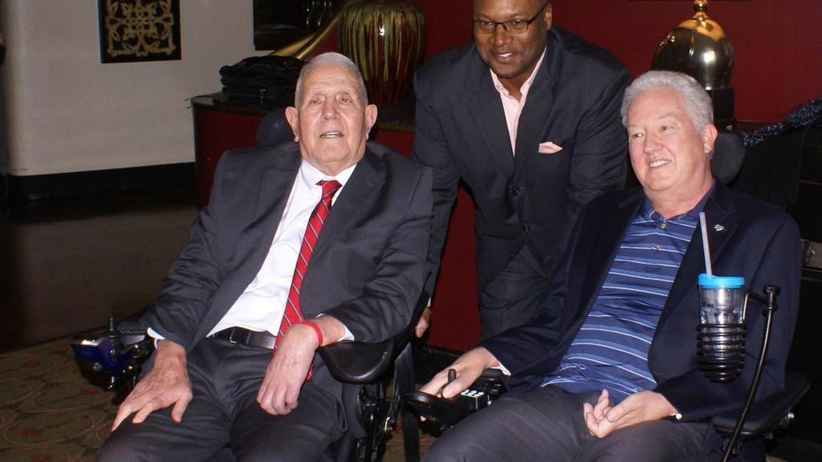 Former Auburn running back Bo Jackson poses for a photo with his former assistant coach Frank Orgel (left) at the second annual “Changing the Game” event Wednesday, Feb. 25, 2015 in Birmingham.