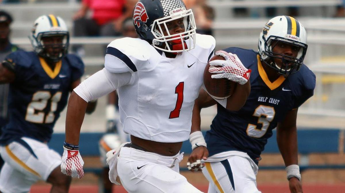 Octavius Matthews breaks a long run during his 115-yard, 10 carry performance against Coahoma.