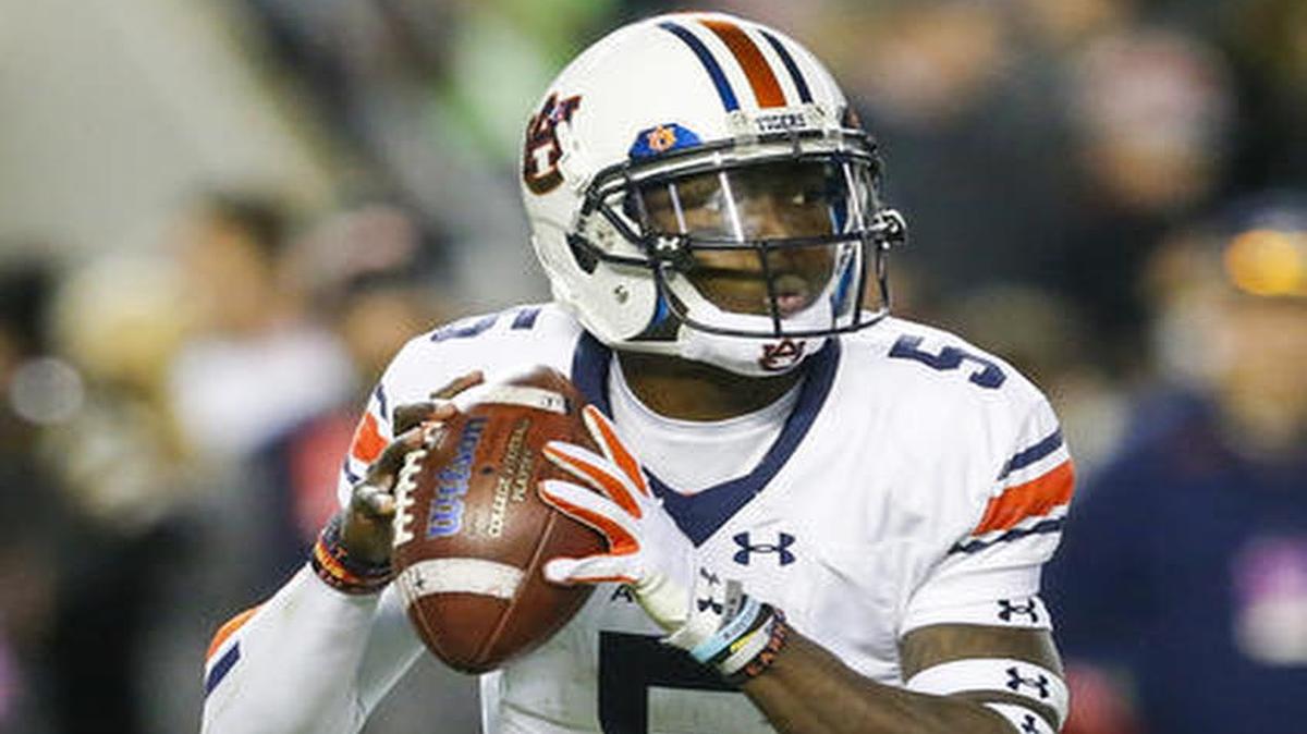 Auburn quarterback John Franklin III (5) drops back to pass against Alabama Saturday, Nov. 26, 2016, in Tuscaloosa, Ala.
