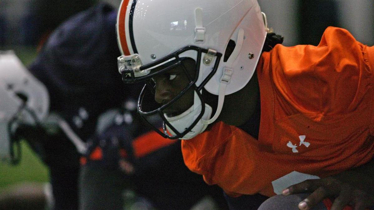Auburn quarterback Woody Barrett stretches before practice for the Sugar Bowl at the Saints' practice facility outside of New Orleans Saturday, Dec. 31, 2016.