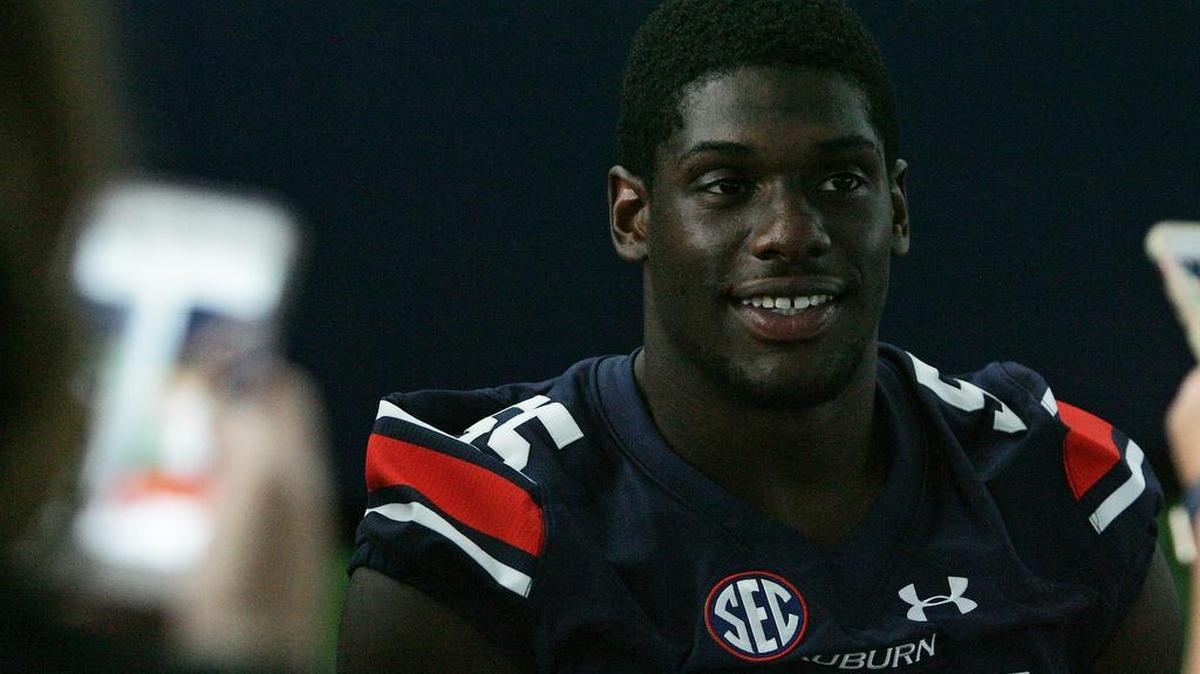 Auburn defensive lineman Carl Lawson at the program's annual Fan Day.