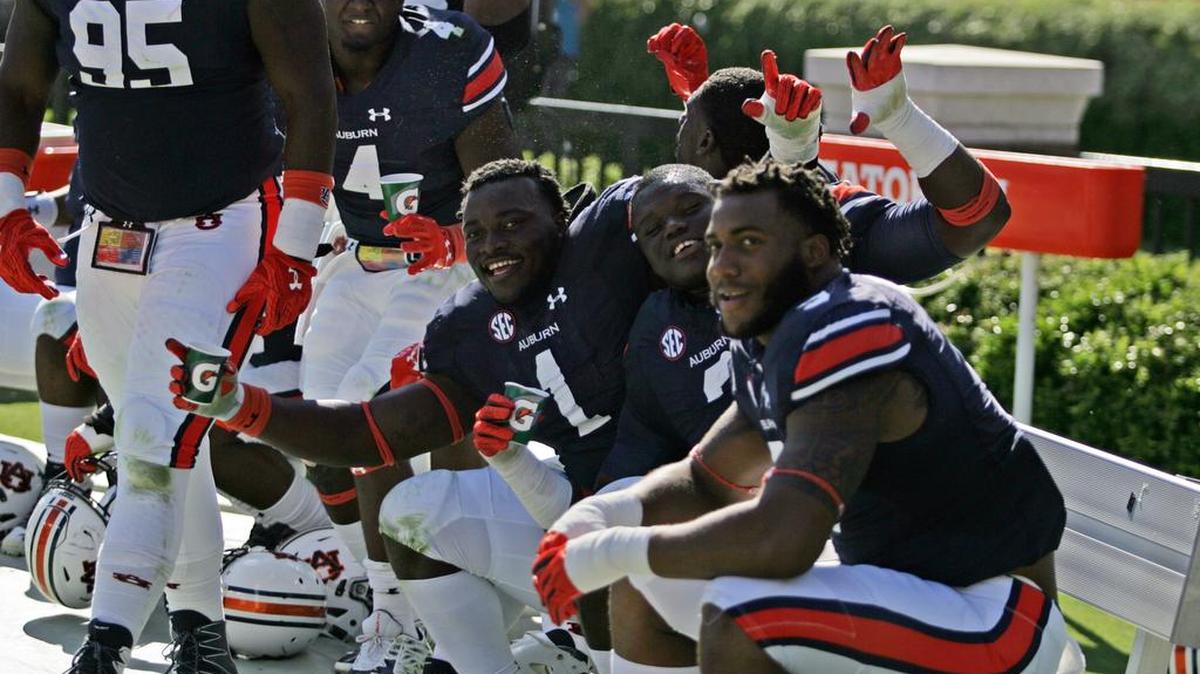 Auburn's defensive line poses for a group photo during a 58-7 win over ULM Saturday, Oct. 1, 2016 at Jordan-Hare Stadium.