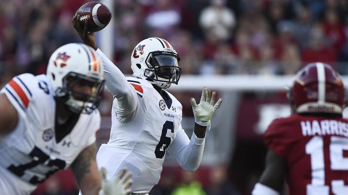 In this file photo, Auburn quarterback Jeremy Johnson throws the ball against Alabama at Bryant-Denny Stadium in Tuscaloosa, Ala., on Saturday, Nov. 26, 2016.
