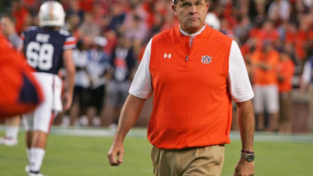 Auburn coach Gus Malzahn walks the field before his team plays Clemson Saturday, Sept. 3, 2016 at Jordan-Hare Stadium.