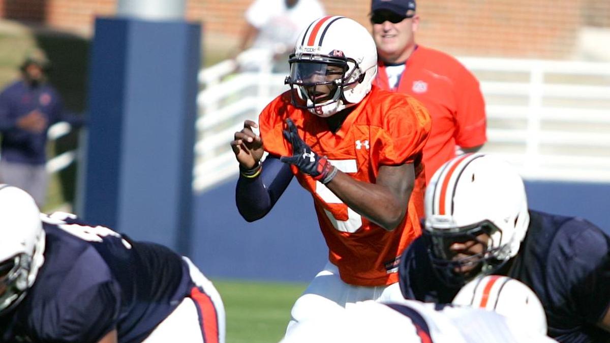 Auburn quarterback John Franklin III lines up under center at practice on Tuesday, April 5, 2016.
