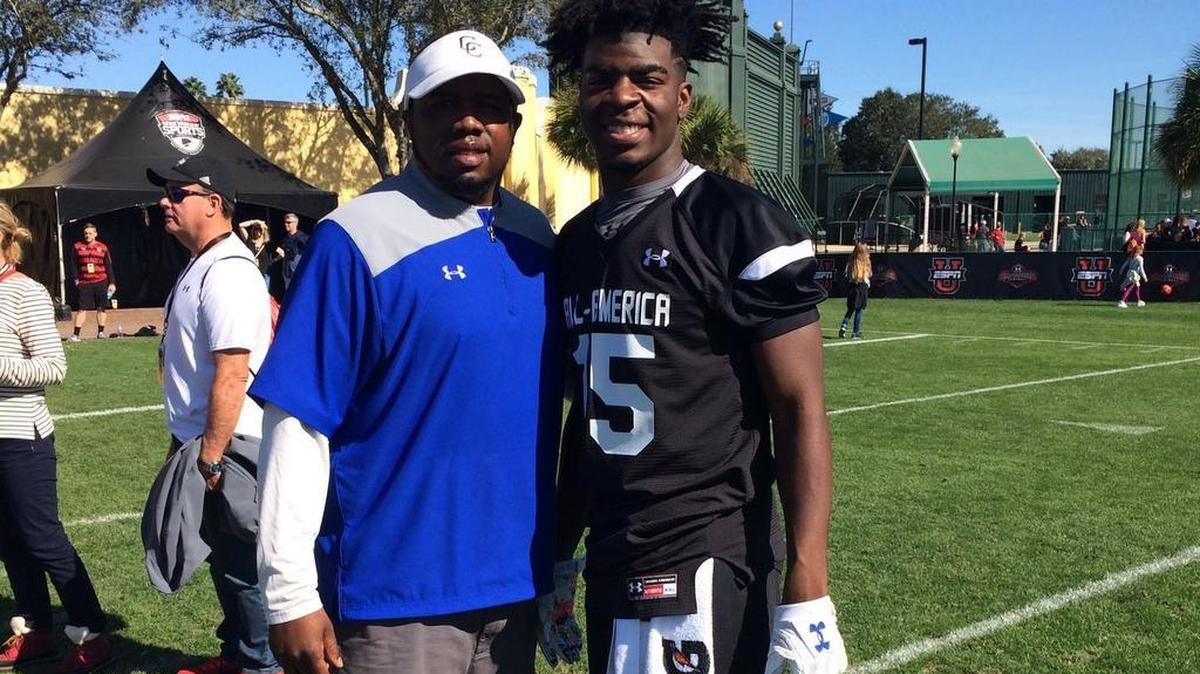 Crisp County coach Shelton Felton, left, with defensive lineman Markaviest Bryant at the Under Armour All-American Game.