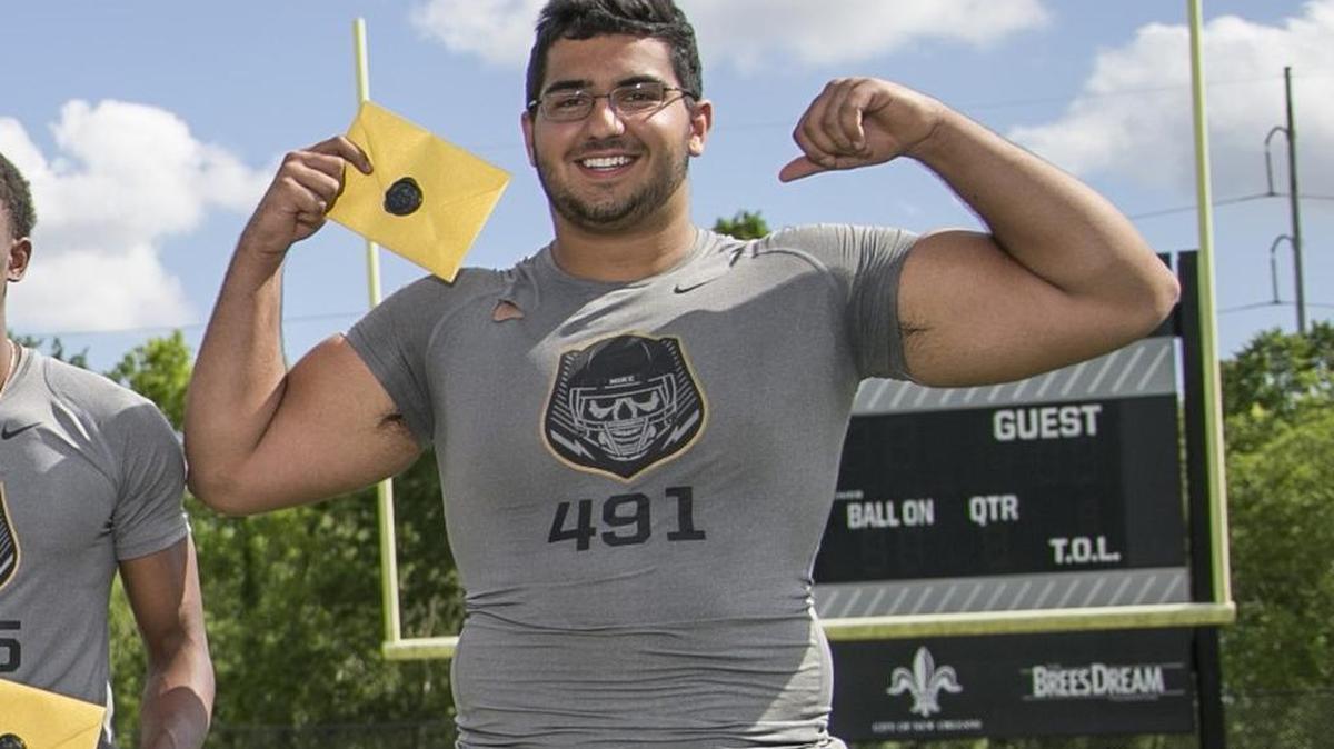 Offensive lineman Nick Brahms celebrates receiving an invite to The Opening finals.