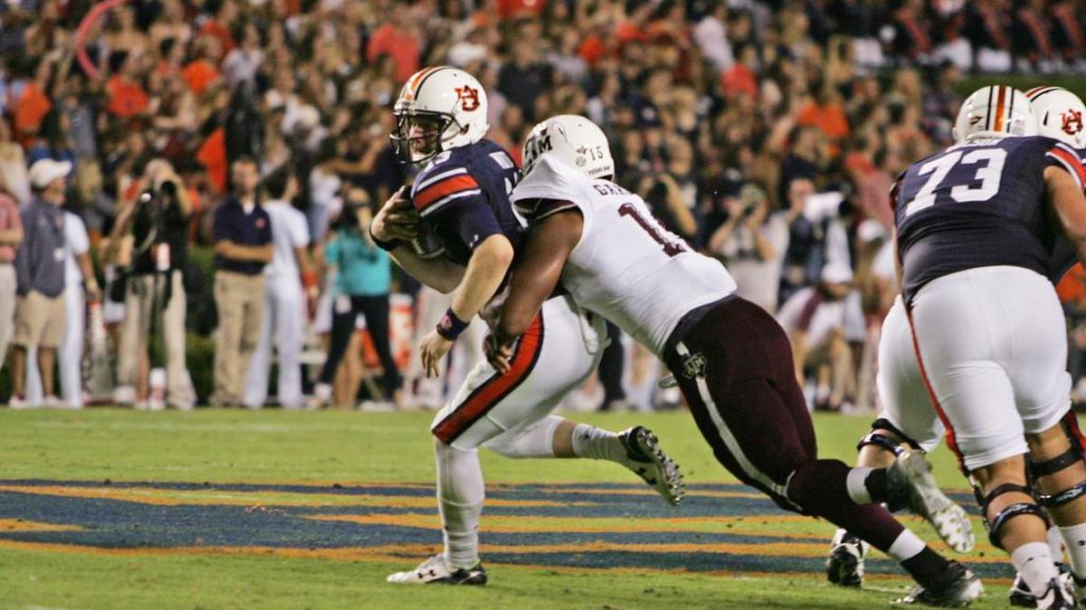 Auburn quarterback Sean White gets sacked by Texas A&M defensive end Myles Garrett Saturday, Sept. 17, 2016 at Jordan-Hare Stadium.