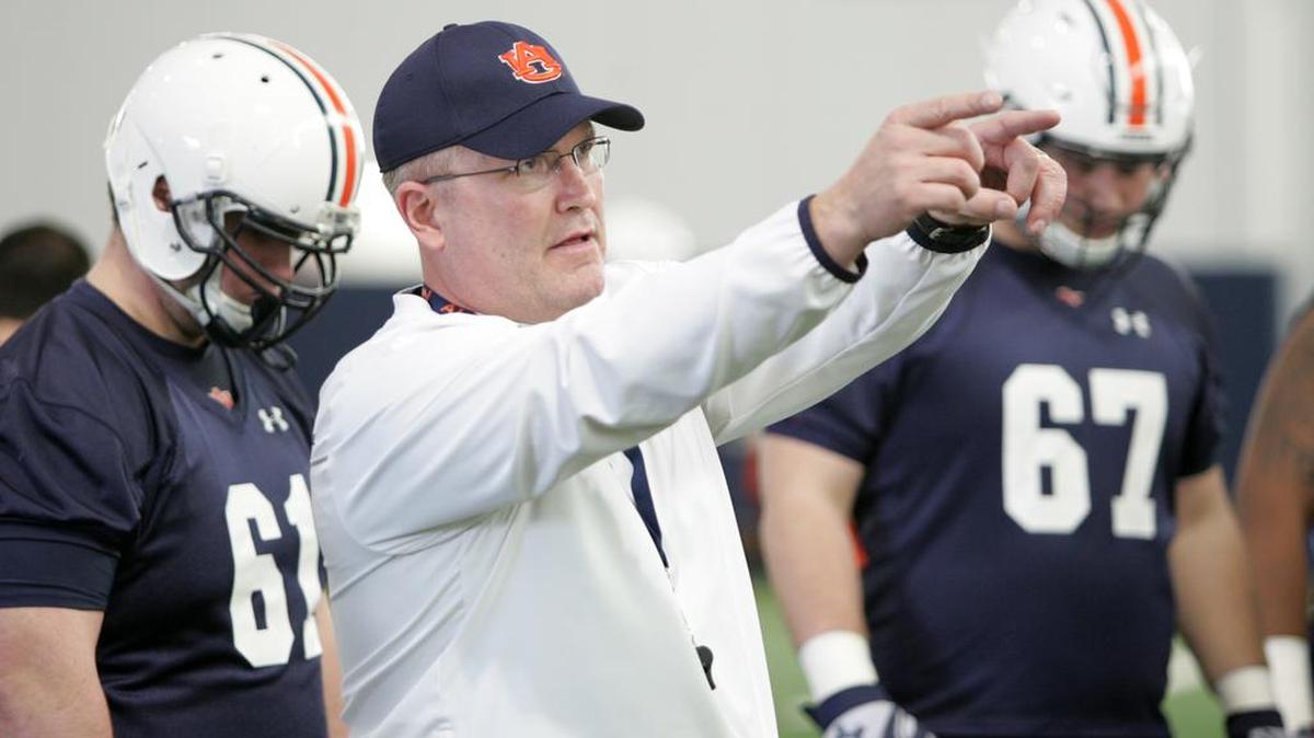 New Auburn offensive line Herb Hands points during a drill on the first day of spring practice at the university's athletic complex on March 1, 2016.
