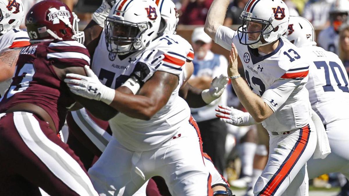 Auburn offensive lineman Darius James, No. 78, blocks for quarterback Sean White against Mississippi State in Saturday, Oct. 8, 2016, in Starkville, Miss.