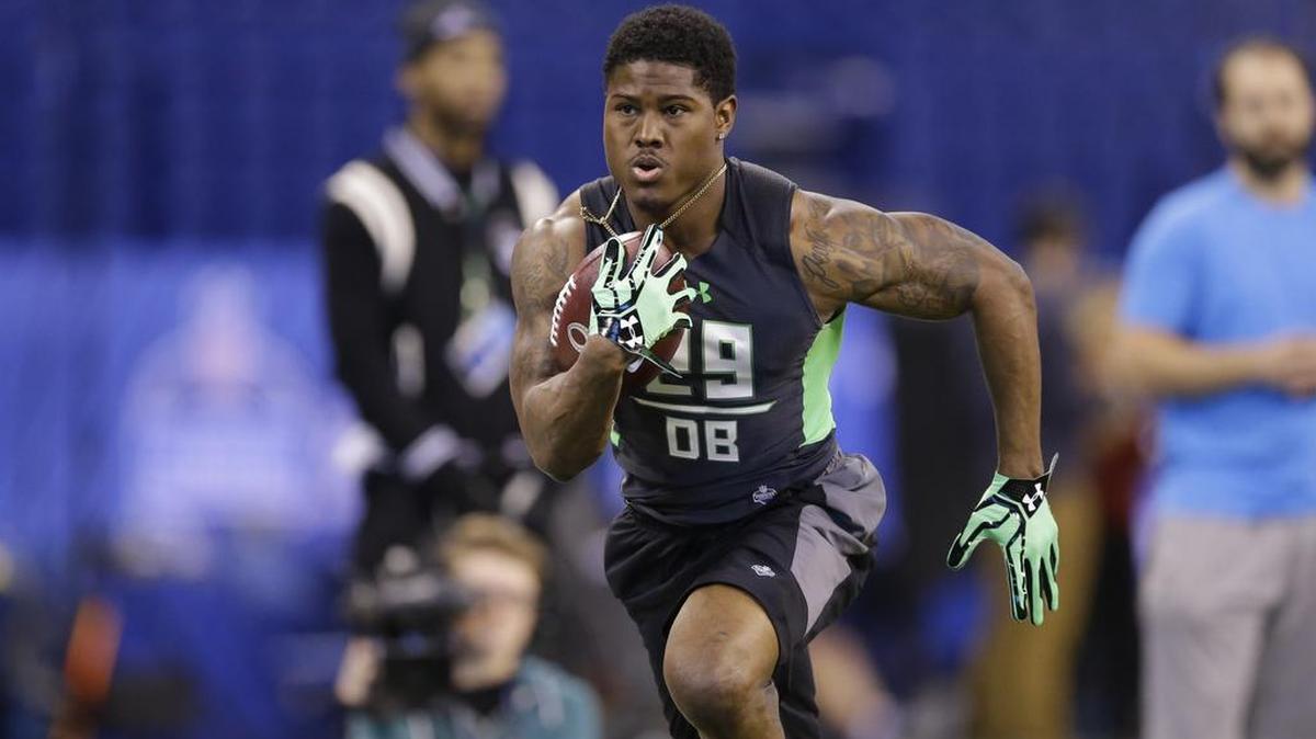 Auburn defensive back Jonathan Jones runs a drill at the NFL football scouting combine in Indianapolis, Monday, Feb. 29, 2016.