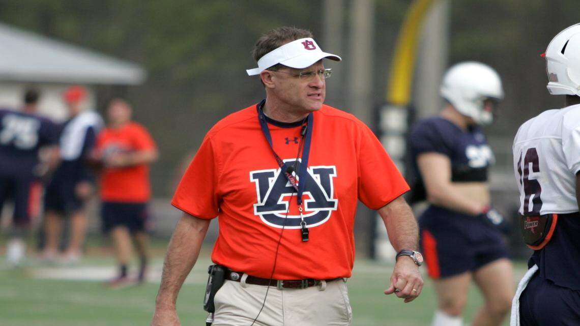 Auburn coach Gus Malzahn watches his team practice for the Birmingham Bowl at Hoover High School’s football stadium Sunday, Dec. 27, 2015. (Michael Niziolek | mniziolek@ledger-enquirer.com)