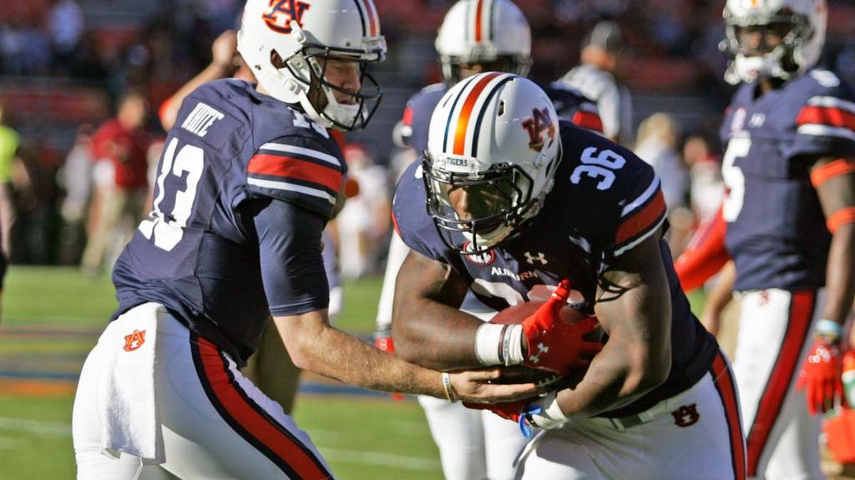 Auburn running back Kamryn Pettway takes a handoff in pregame drills Saturdat, Oct. 22, 2016 at Jordan-Hare Stadium.