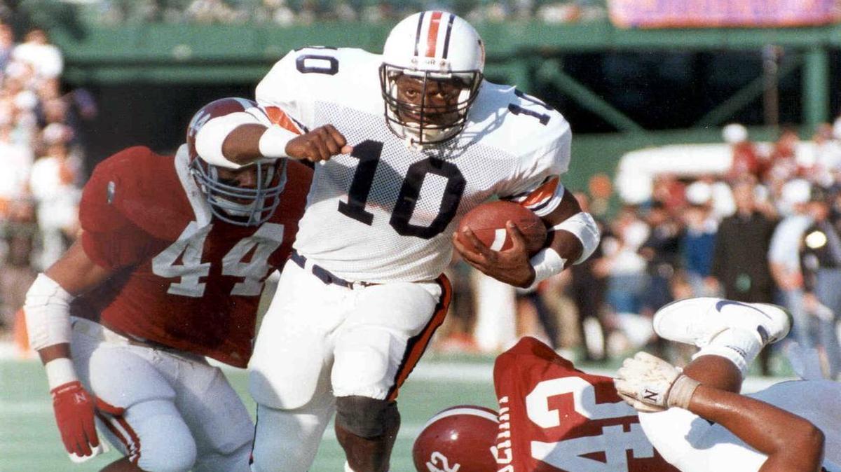 Former Auburn running back James Joseph carries the ball against Alabama in the Iron Bowl.