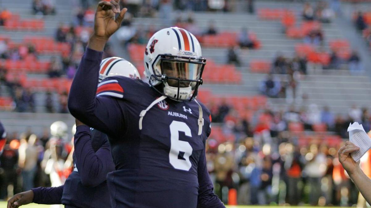 Auburn quarterback Jeremy Johnson warms up before playing Arkansas at Jordan-Hare Stadium.