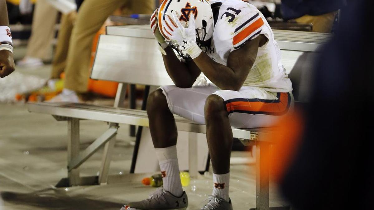 Auburn defensive back Javaris Davis (31) sits on the bench in the finals moments of their 13-7 loss to Georgia in an NCAA college football game Saturday, Nov. 12, 2016, in Athens, Ga.