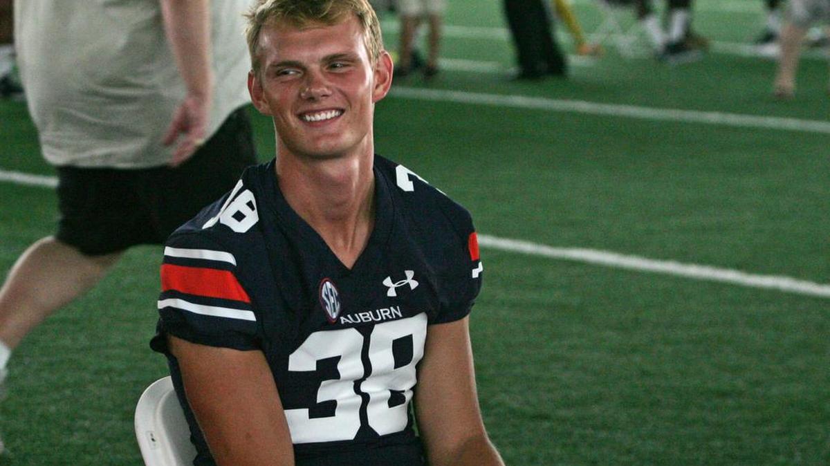 Auburn kicker Daniel Carlson smiles at the program's annual Fan Day on Sunday, August 14, 2016.