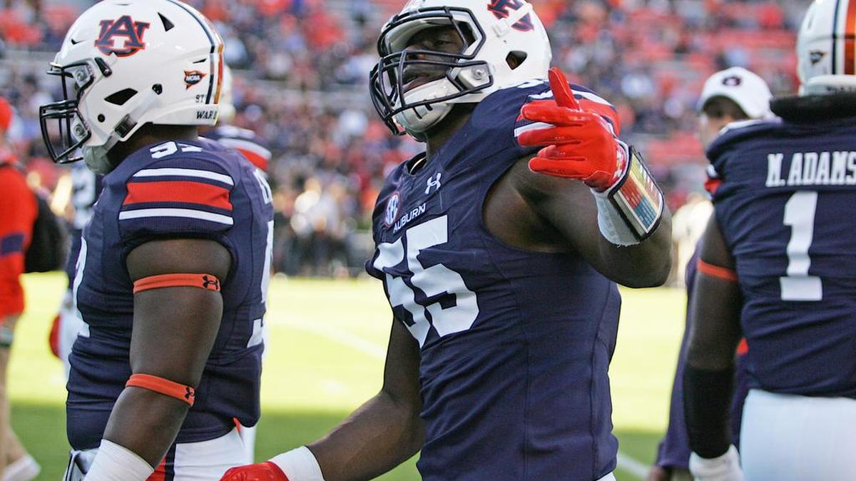 Auburn defensive lineman Carl Lawson dances in the pregame before playing Arkansas Saturday, Oct. 22, 2016 at Jordan-Hare Stadium.