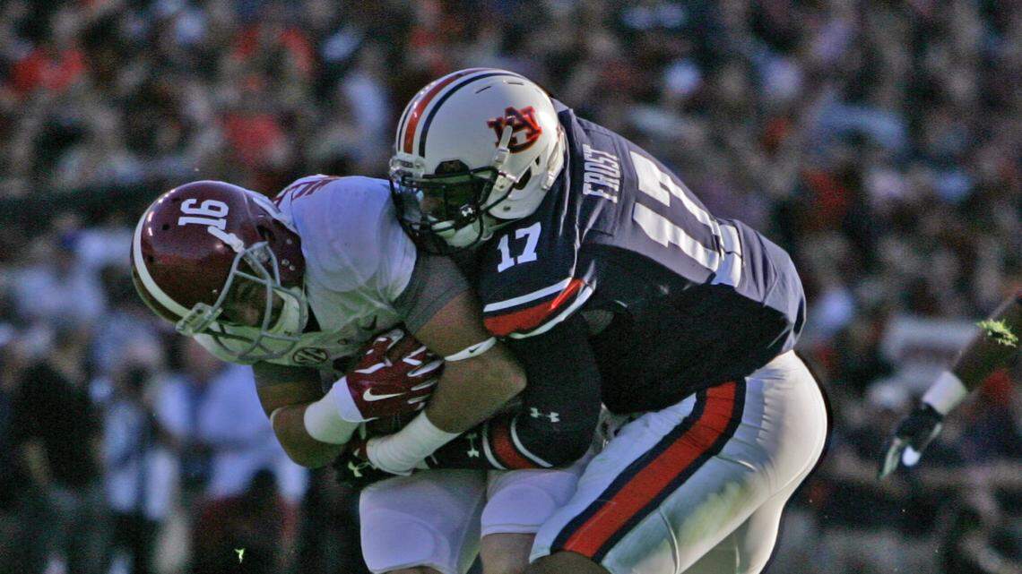 Auburn linebacker Kris Frost tackles Richard Mullaney Saturday, Nov. 28, 2015 at Jordan-Hare Stadium in the Iron Bowl.