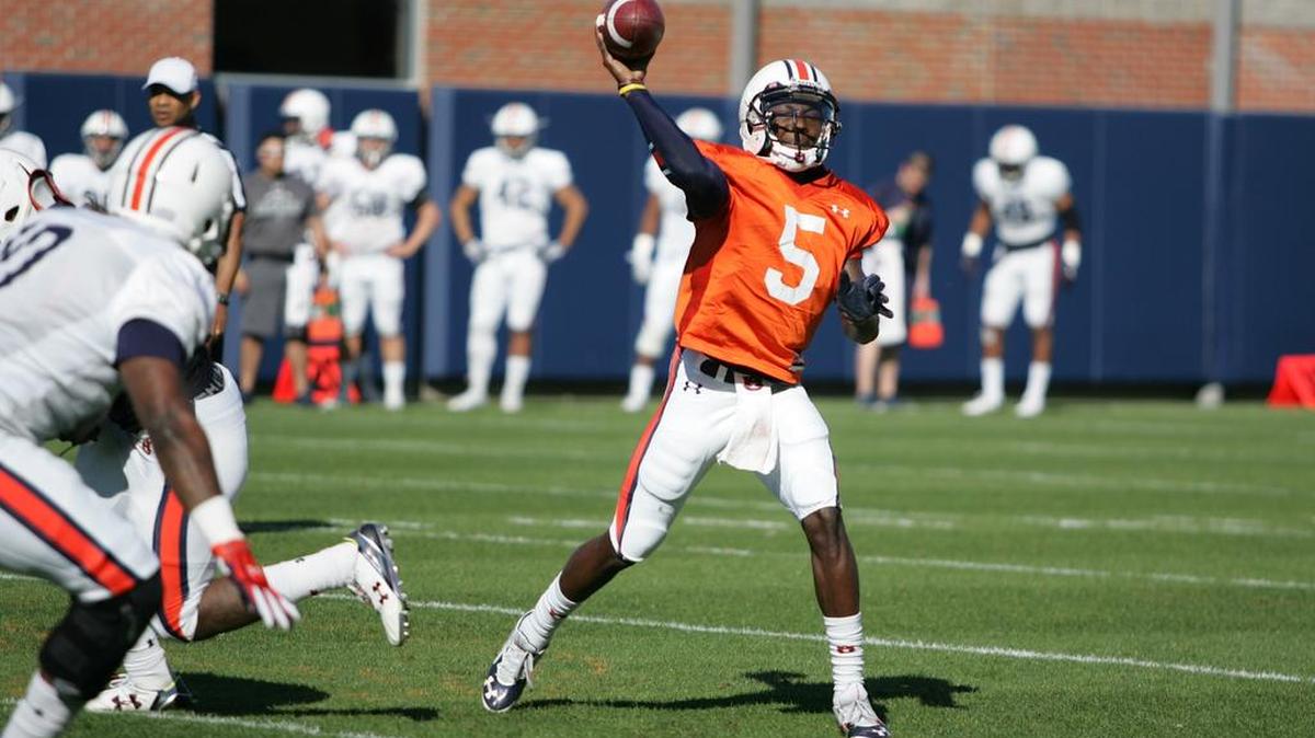 Auburn quarterback John Franklin III throws the ball at the university's athletic complex Tuesday, April 5, 2016.