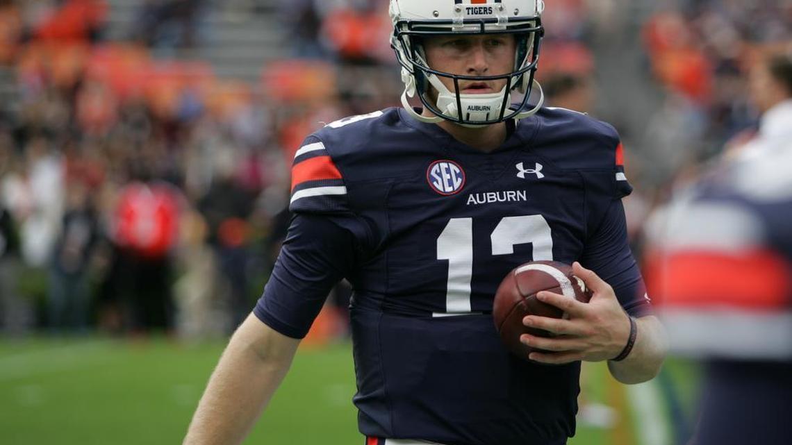 Auburn quarterback Sean White's broken forearm won't be fully healed when the program open spring practice on March 1.