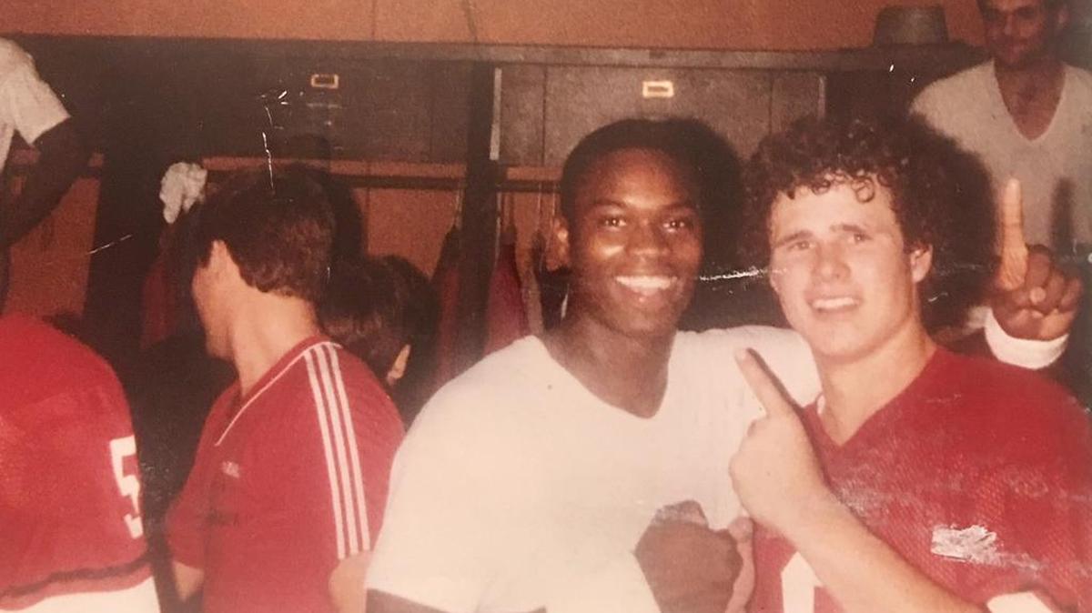 Columbus native Daryll Jones, left, with Georgia teammate Buck Belue celebrating the 1980 national championship.
