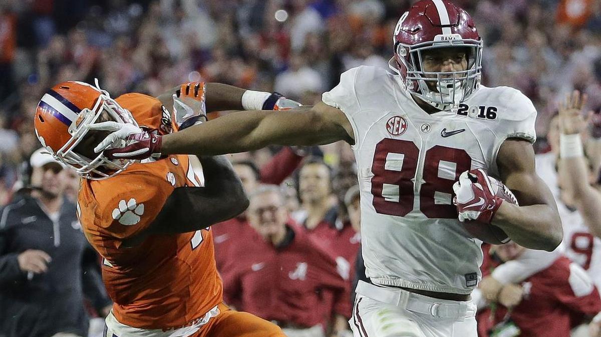 Alabama's O.J. Howard tries to get past Clemson's T.J. Green after a catch during the second half of the College Football Playoff championship game Jan. 11 in Glendale, Ariz.