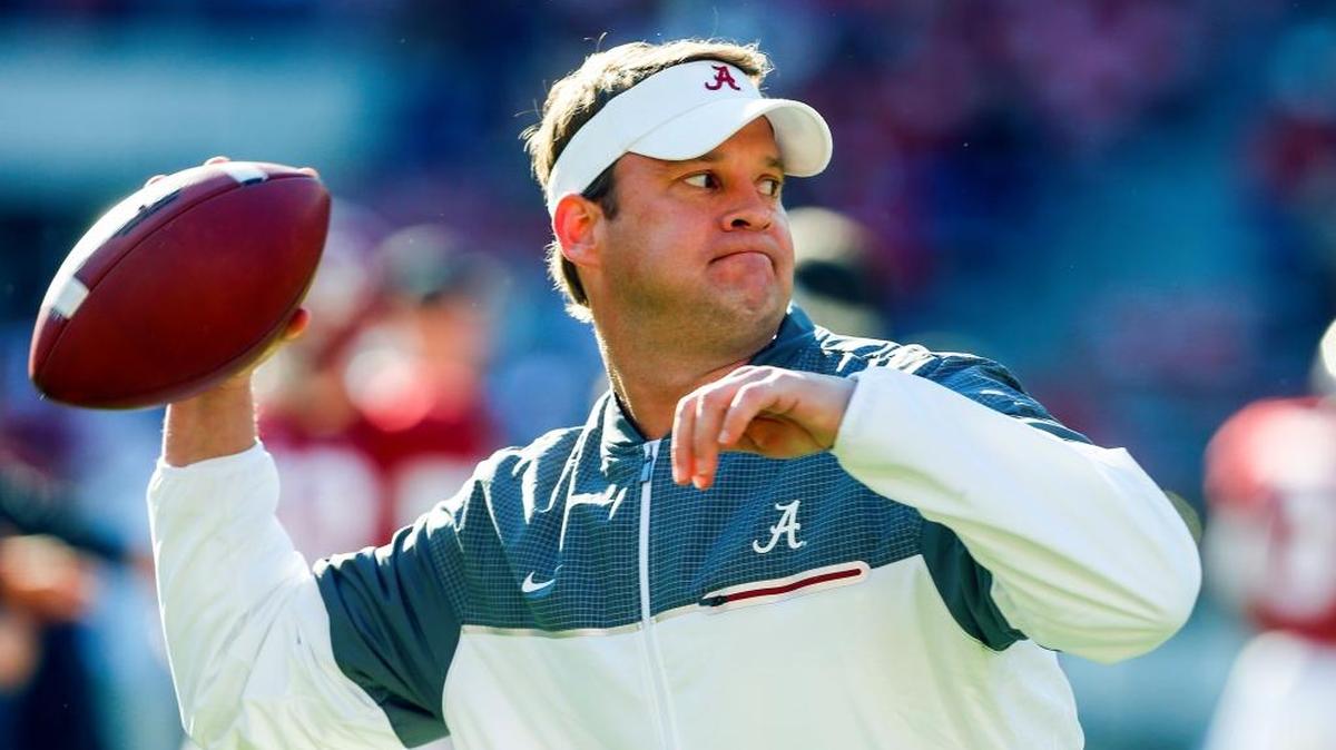 FILE - In this Saturday, Nov. 26, 2016 file photo, Alabama offensive coordinator Lane Kiffin throws a pass during warmups before the Iron Bowl NCAA football game against Auburn in Tuscaloosa, Ala.