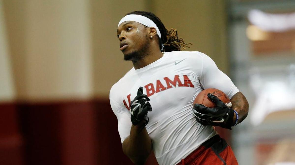 Running back Derrick Henry runs the ball during a drill at Alabama's pro day Wednesday in Tuscaloosa, Ala.