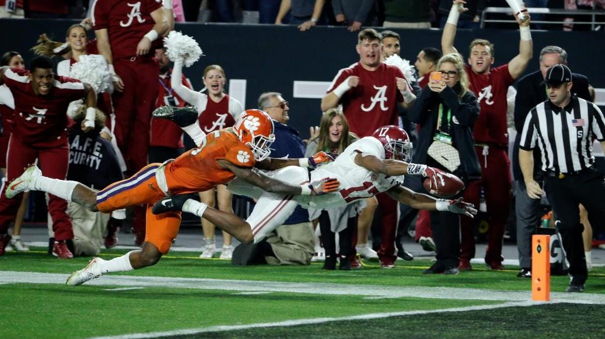 Alabama's Kenyan Drake dives into the end zone as he runs back a kick off for a touchdown during the second half against Clemson in the College Football Playoff in January.