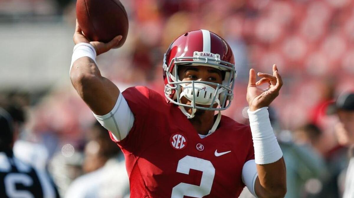 Alabama quarterback Jalen Hurts warms up before the game against Mississippi State on Saturday.