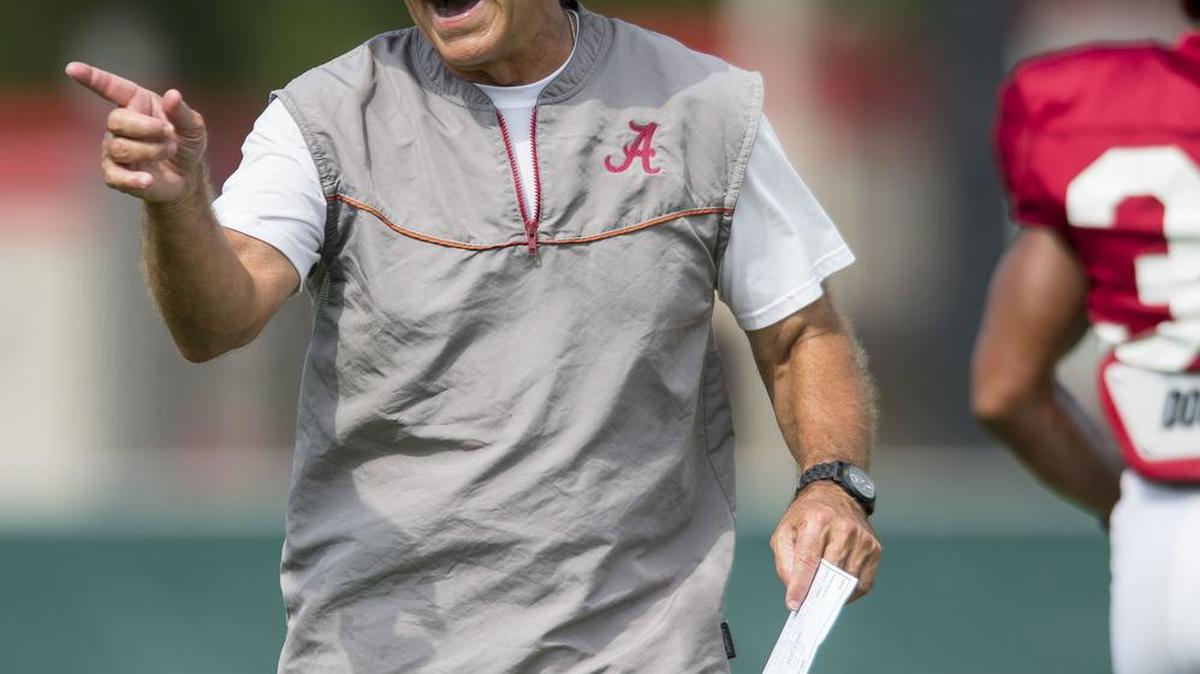 Alabama coach Nick Saban works with his players during practice earlier this month.