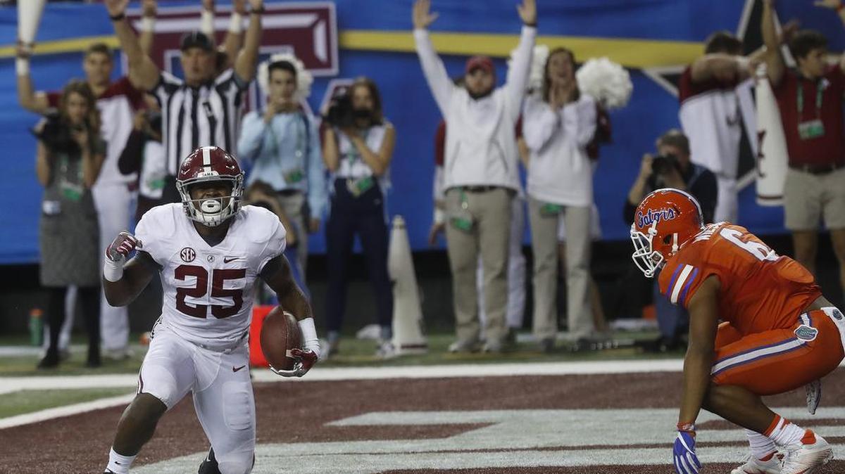 Alabama running back Joshua Jacobs (25) celebrates his touchdown against Florida during the first half of the Southeastern Conference championship NCAA college football game, Saturday, Dec. 3, 2016, in Atlanta.