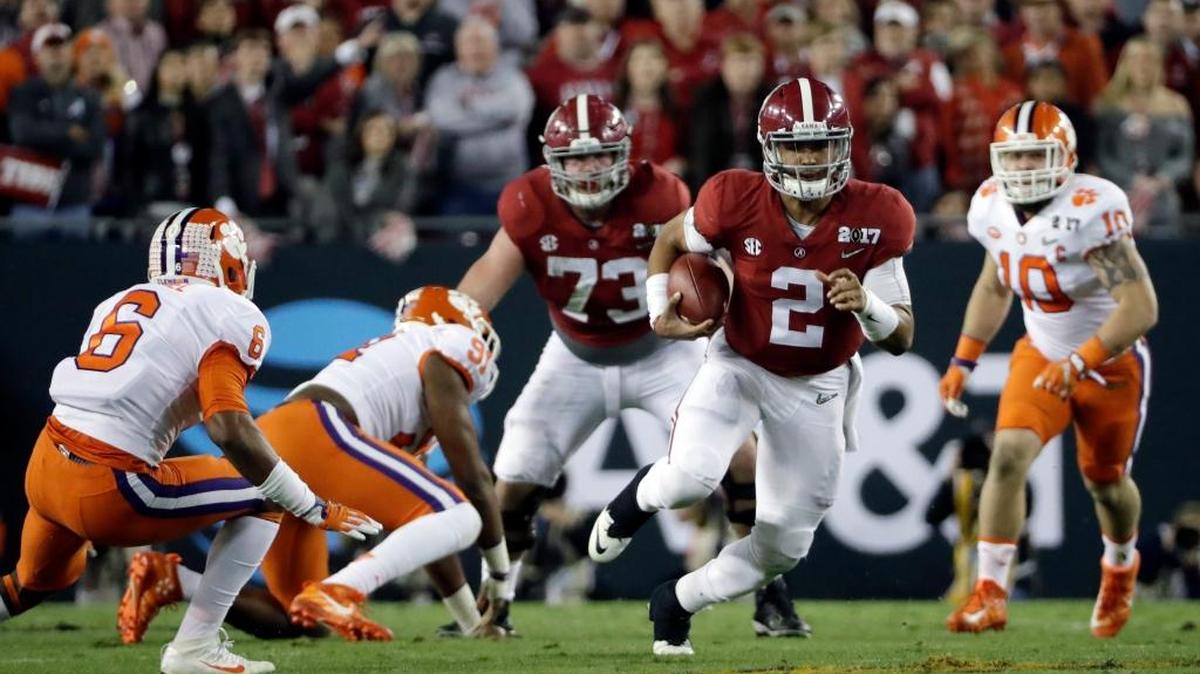 Alabama’s Jalen Hurts runs during the first half of the NCAA college football playoff championship game against Clemson Monday, Jan. 9, 2017, in Tampa, Fla.