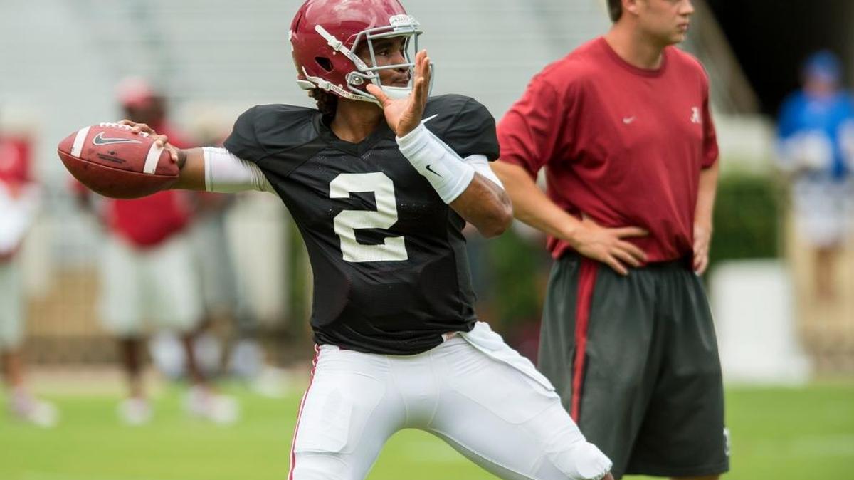 Alabama quarterback Jalen Hurts (2) works through drills during NCAA college football practice, Saturday, Aug. 13, 2016, at Bryant-Denny Stadium in Tuscaloosa, Ala.