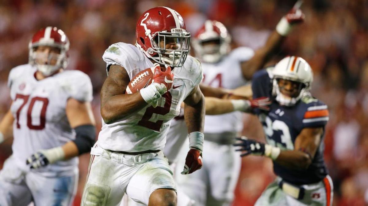 Alabama running back Derrick Henry runs for a touchdown in the second half against Auburn last November.