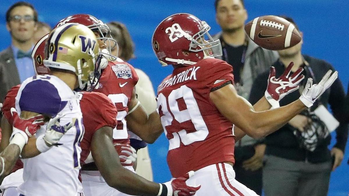 Alabama defensive back Minkah Fitzpatrick (29) intercepts the ball against Washington during the Peach Bowl on Dec. 31.