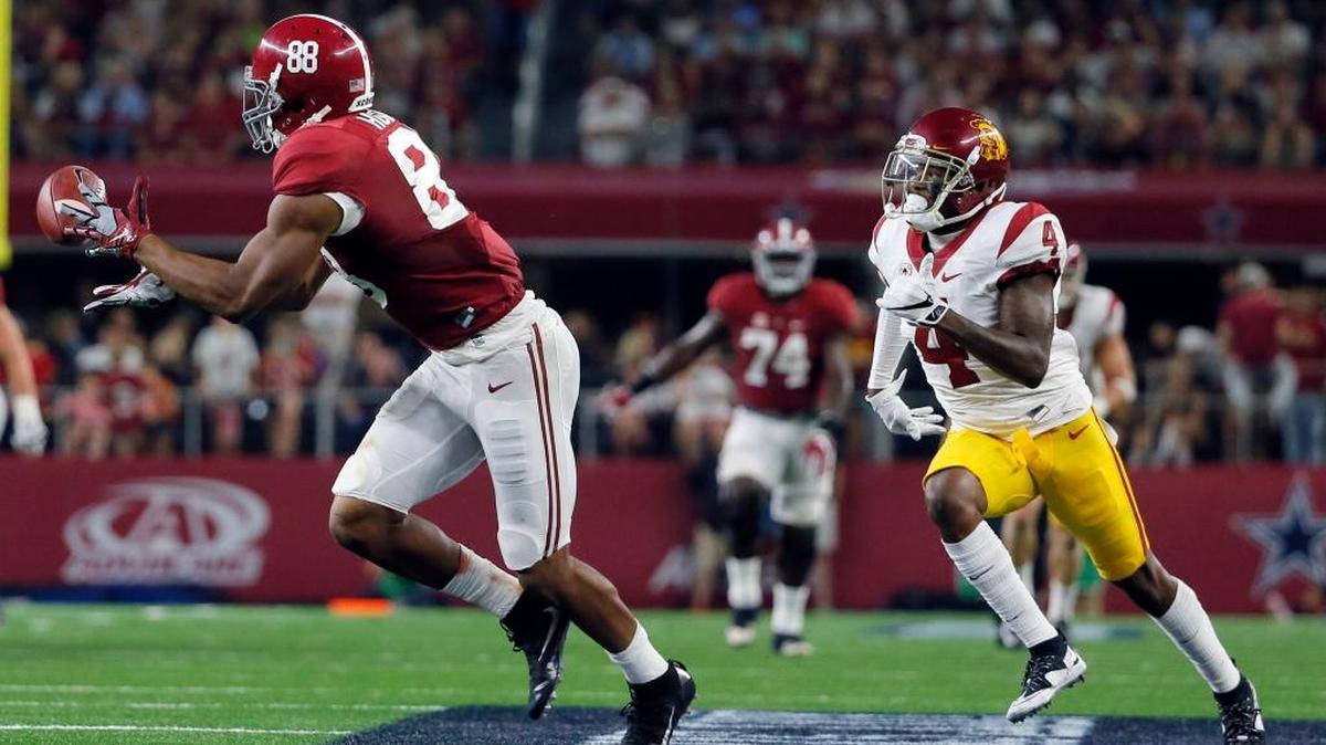 Alabama tight end O.J. Howard (88) catches a pass as Southern California defensive back Chris Hawkins defendsduring the second half of an NCAA college football game on Sept. 3.