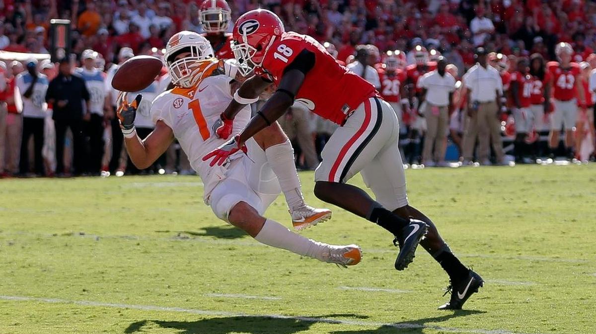 Georgia’s Deandre Baker lays a hit on then-Tennessee running back Jalen Hurd at the 1-yard line, which forced a fumble.