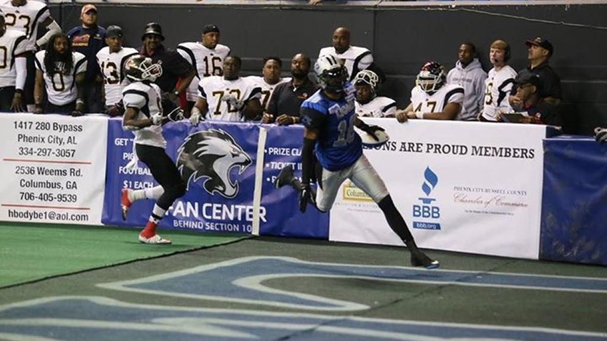 Columbus Lions receiver Michael Reeve scores against Georgia on March 20 at the Columbus Civic Center.