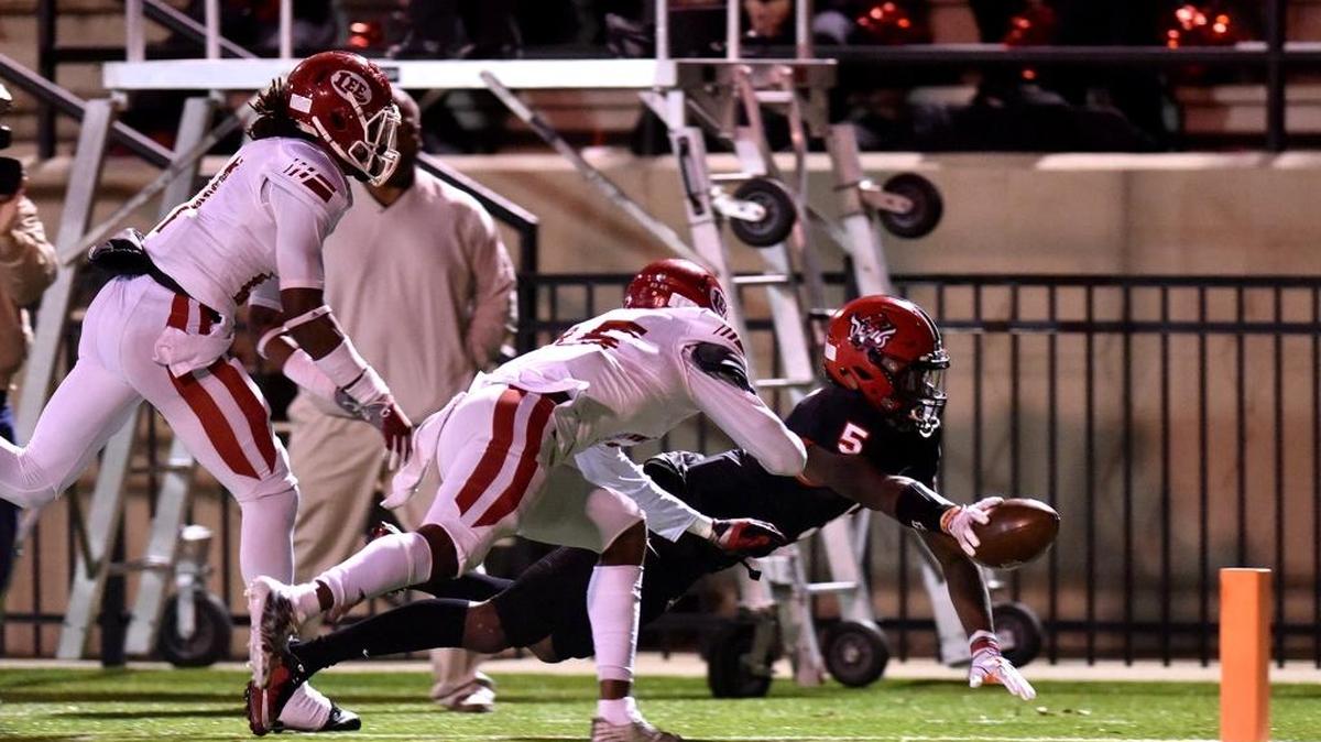 Justyn Ross dives for the end zone and a Central touchdown Saturday against Lee-Montgomery in the second round of the AHSAA football playoffs Friday, Nov. 17, 2017.