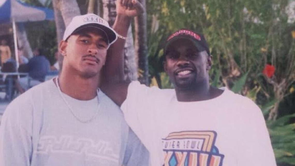 Gary Downs (left) and Randy Fuller (right) pose days before they played for the Atlanta Falcons in Super Bowl XXXIII