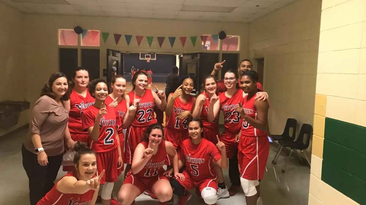 The Pacelli Lady Vikings celebrate after snapping their long losing streak with Monday’s victory over Webster County