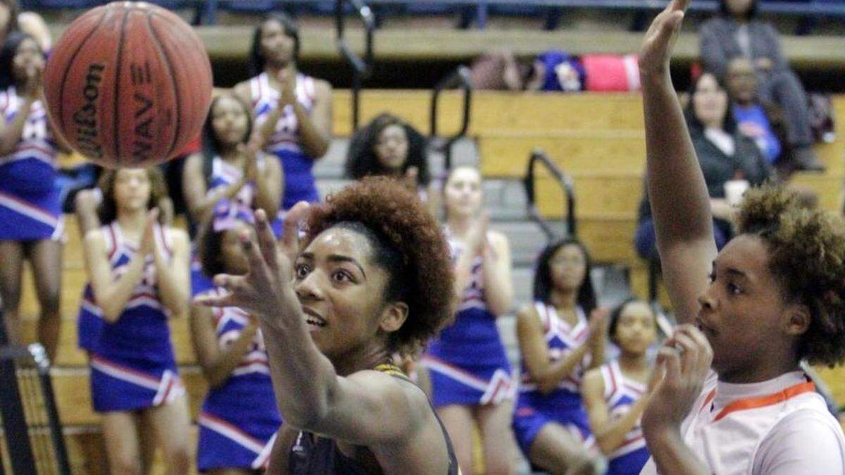 Harris County's Jessika Carter, left, leads the undefeated Lady Tigers into a prestigious national tournament
