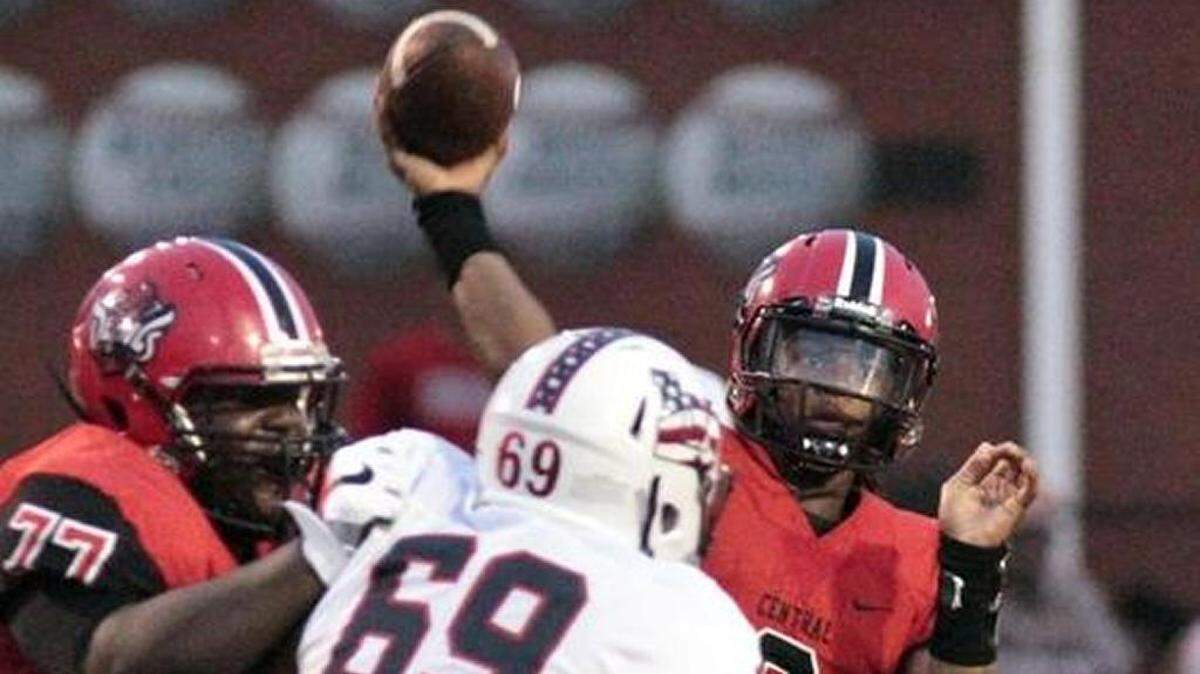 Central High quarterback Peter Parrish throws against Bob Jones of Huntsville at Garrett-Harrison Stadium Friday. The Red Devils won 33-7.