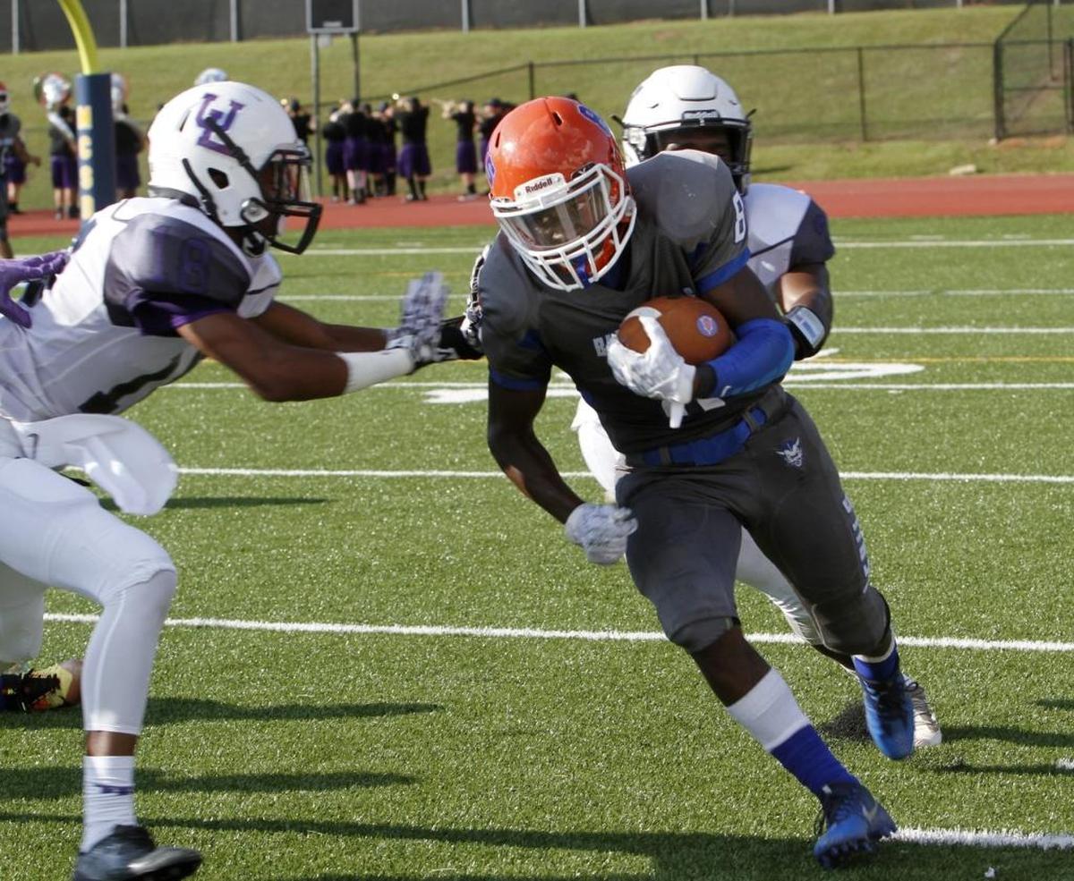 Columbus High running back Trey Peterson rushes against Upson Lee at Kinnett Stadium Friday.